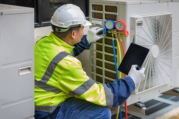 Professional Heat Pump Repair technician working in Zebulon, GA